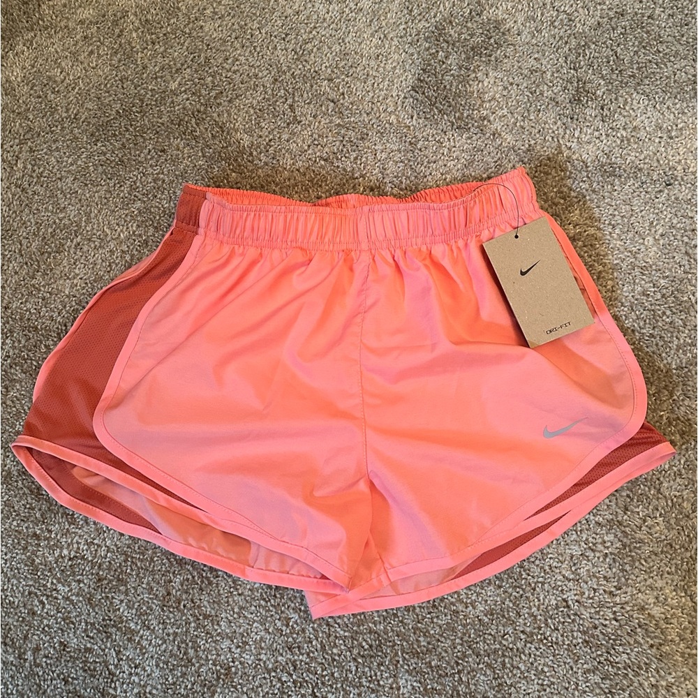 New with tags pink Nike running shirts size small